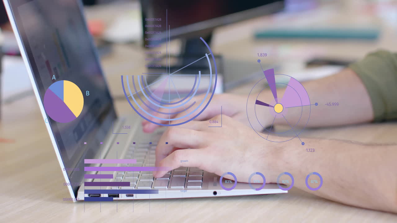 Animation of charts processing data over hands of caucasian man using laptop at office desk