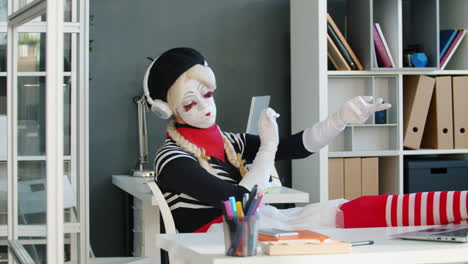 mime performing in an office setting