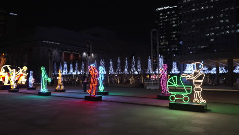 multicolored lantern decorations lighting the street at night in gwanghwamun square