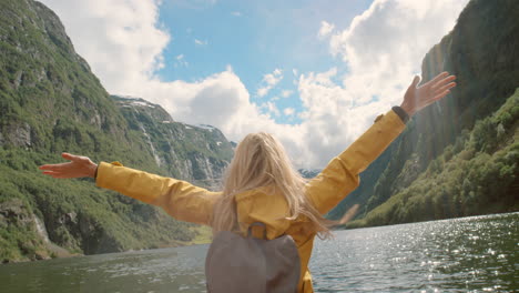 woman enjoying the norwegian fjords