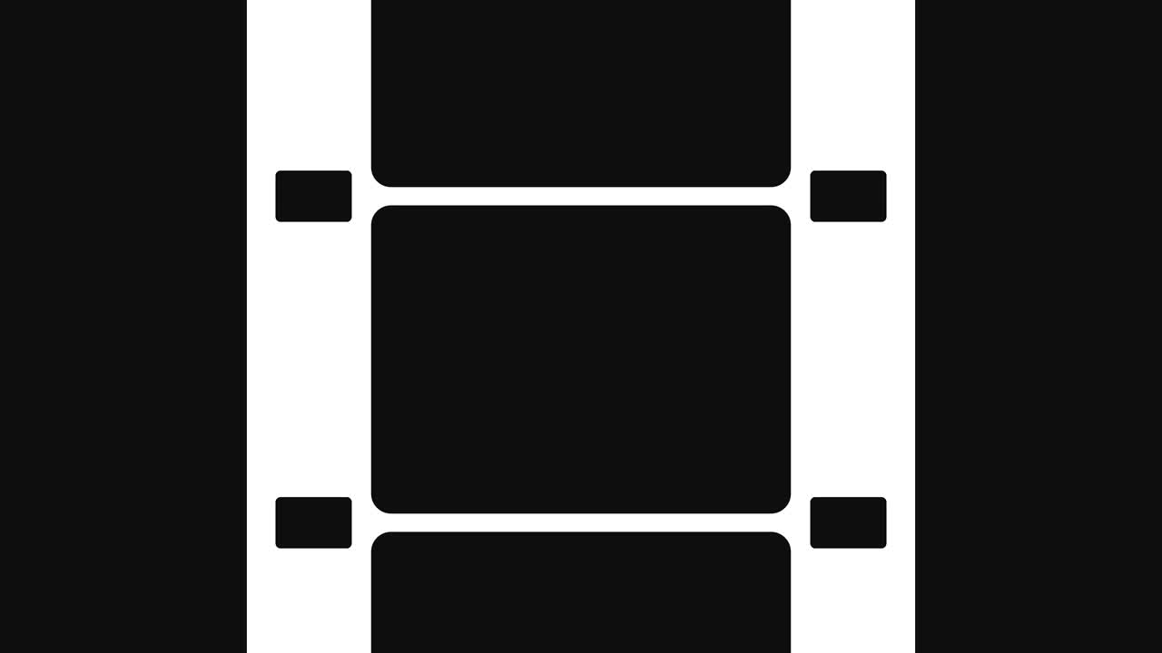 una tira de película de 16 mm se mueve sobre un fondo negro.