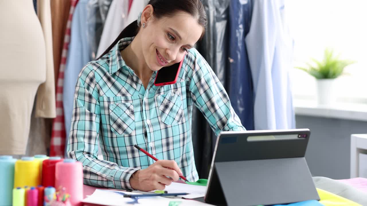 Dressmaker taking a call