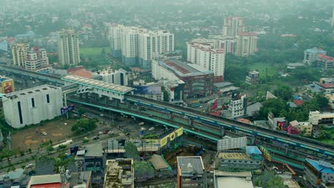 Luftaufnahme-Der-Stadt-Kochi-Edappally-Junction-Ist-Eine-Kreuzung-In-Edappally,-Luftaufnahme-Der-Stadt-Ernakulam_-Edappally-Signal-Junction_Oberleitungsgleis-Der-U-Bahn-Von-Kochi