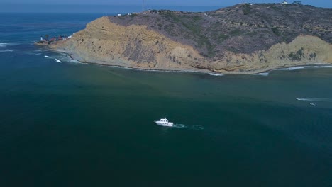 A-Boat-leaving-San-Diego-bay-overlooking-Point-Loma