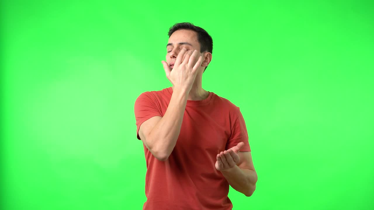 Man showing various emotions on green screen