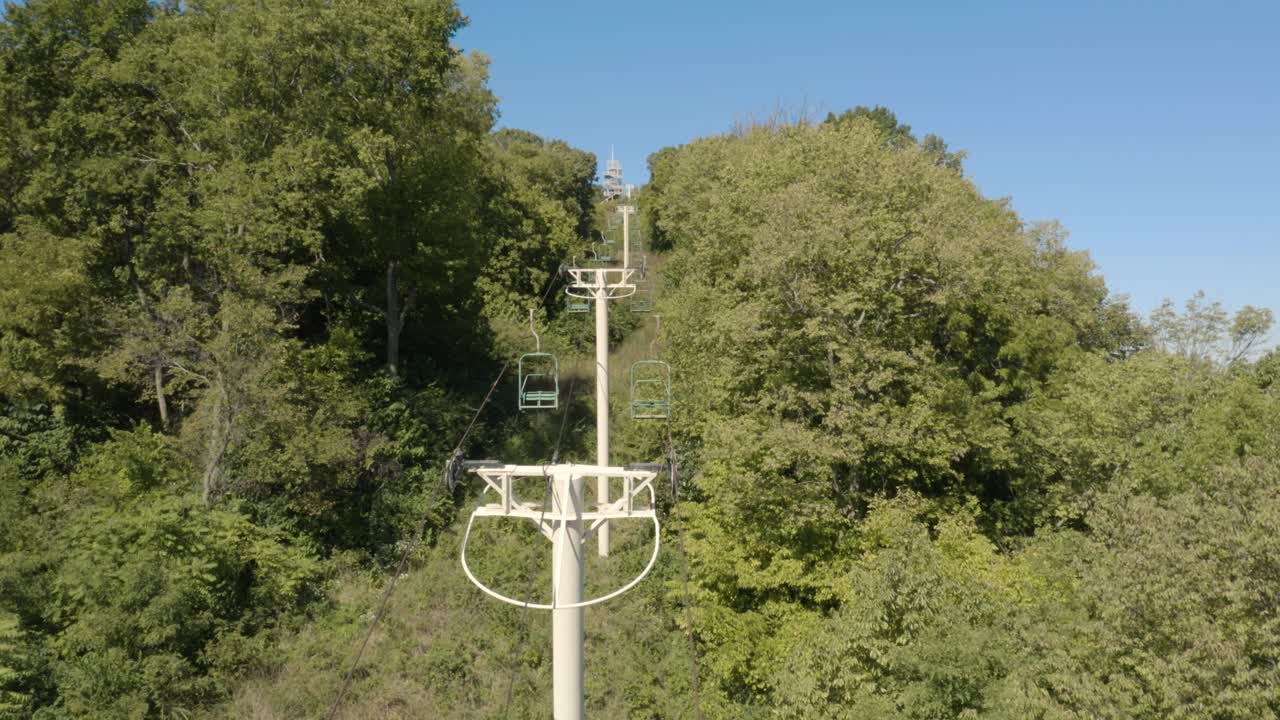 Aerial footage of an old abandoned sight seeing chair lift. 4K footage