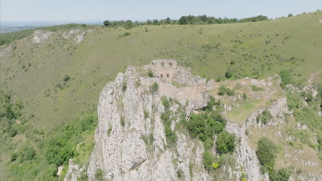 circling around the ruins of the old cathar castle of roquefixade in the french pyrenees mountains