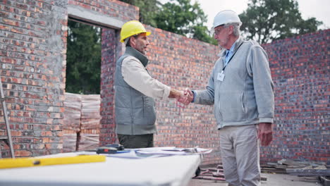 construction workers discussing plans on site