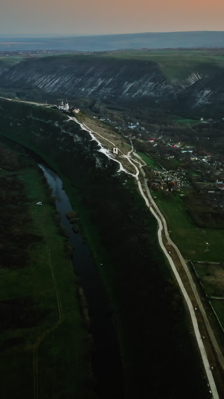 Aerial drone view of the Old Orhei historical and archaeological complex in Moldova at sunset. Vertical
