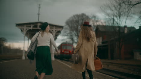 Two-Women-Running-For-Train