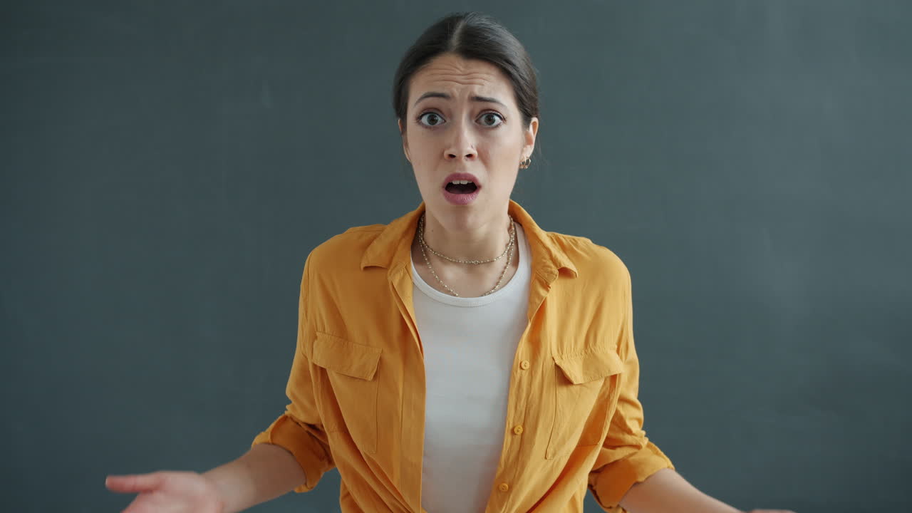 Woman expressing confusion and doubt