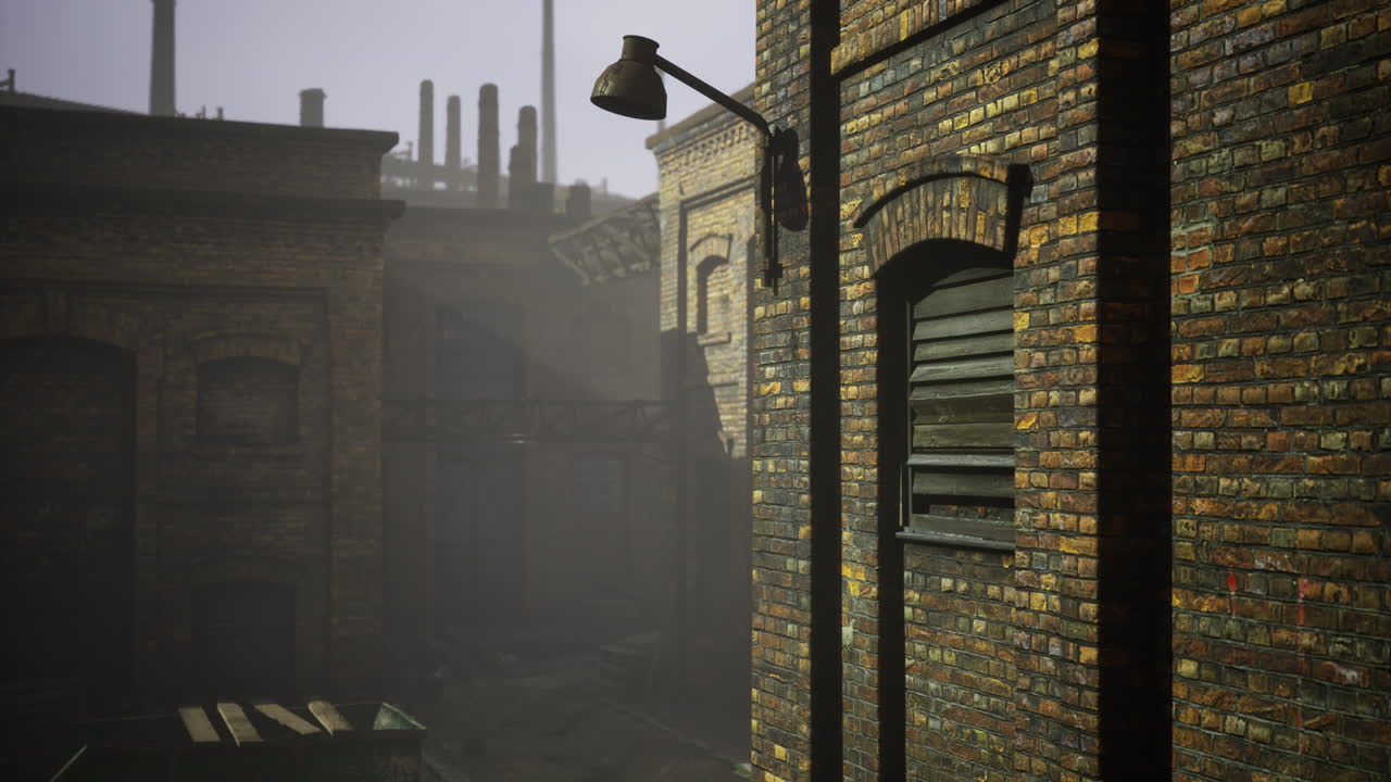 Abandoned industrial area with rustic brick buildings at dawn