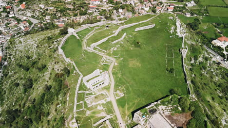 Gorgeous-panoramic-aerial-view-flying-over-castle-ruins-on-a-hill