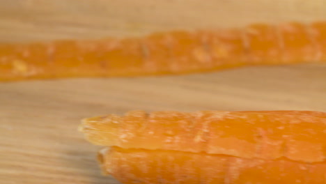 extreme close up peeling a carrot