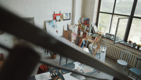 artist working in a painting studio