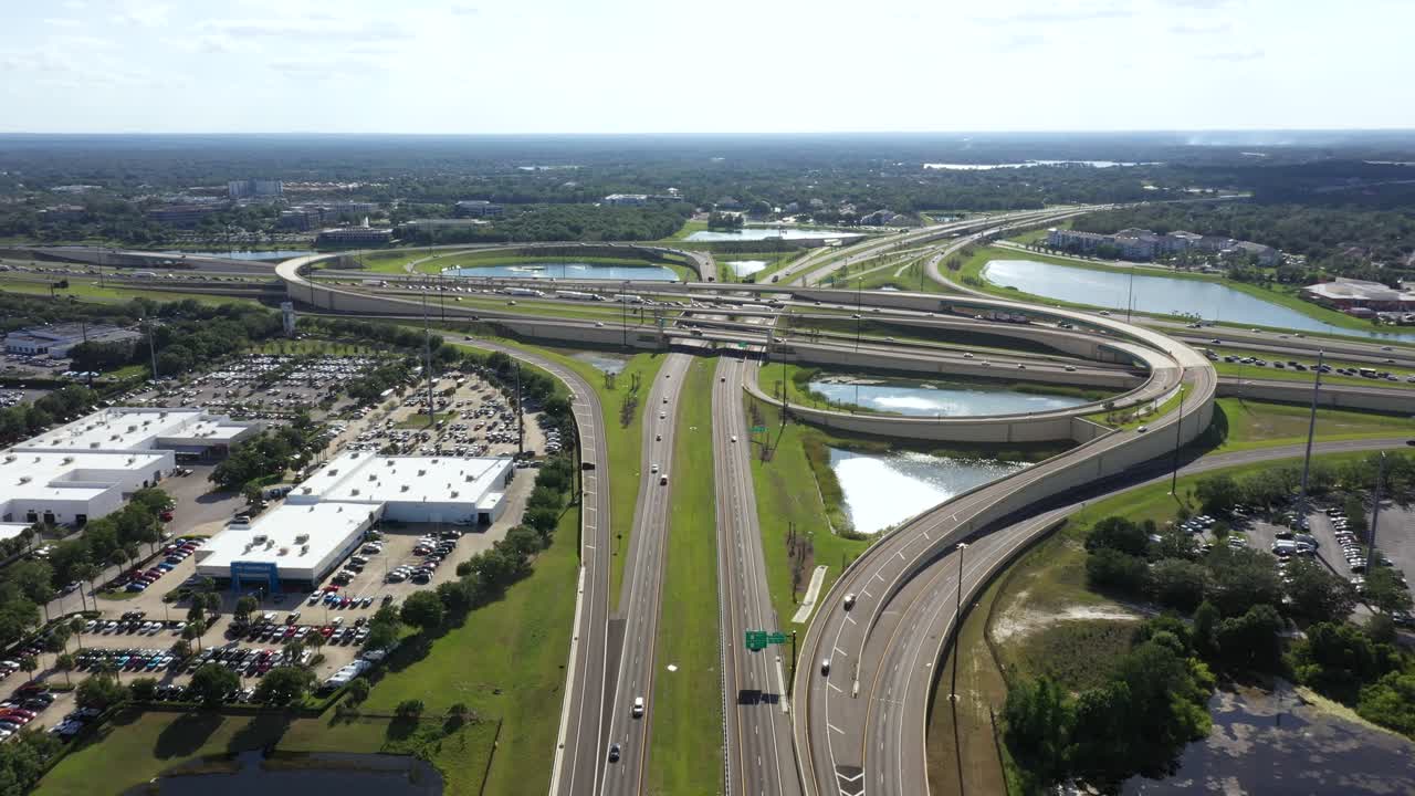 Winding Overpass Roads Of The Wekiva Parkway Connect to I-4 In Sanford, Florida, United States. Aerial Drone Shot