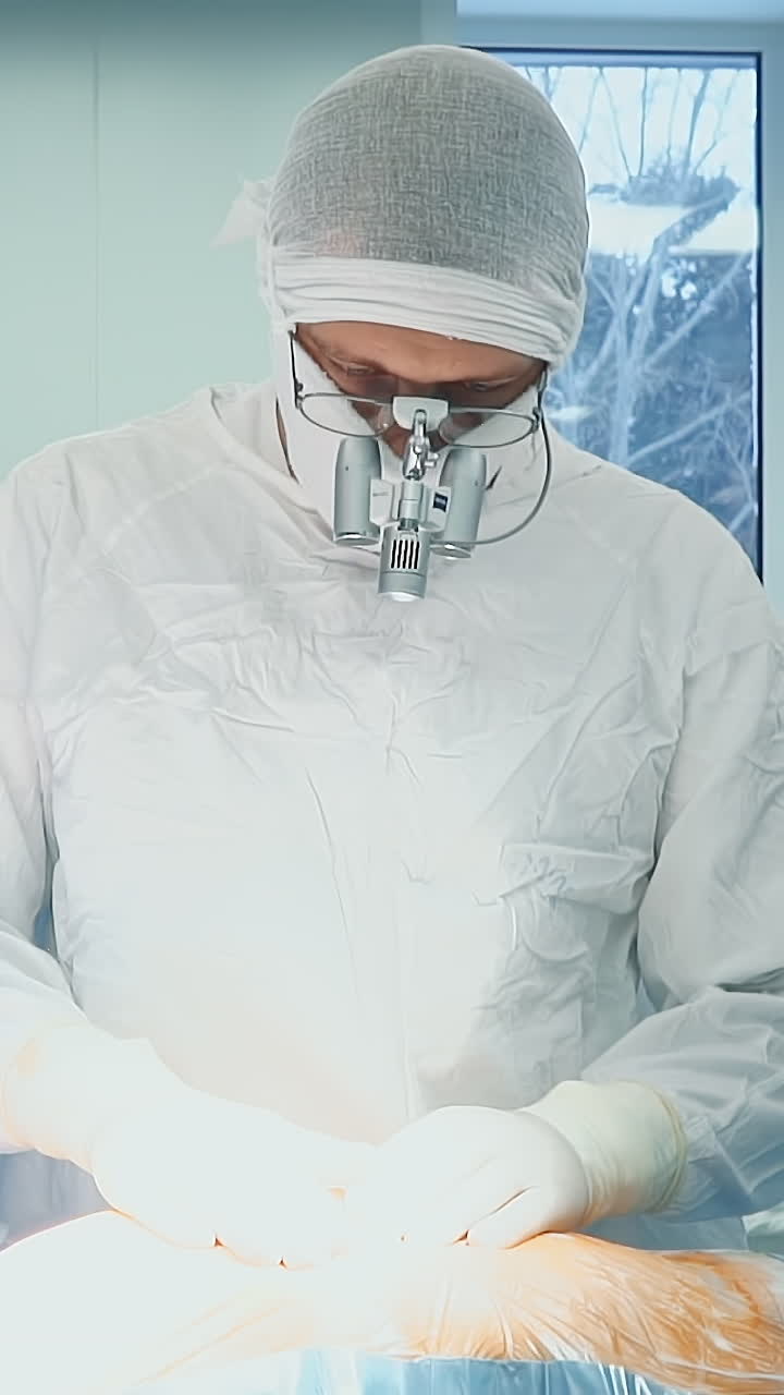 Surgeon massages patient chest in room. Surgeon in latex gloves checks body before coronary artery bypass surgery in hospital. Cardiac medical service