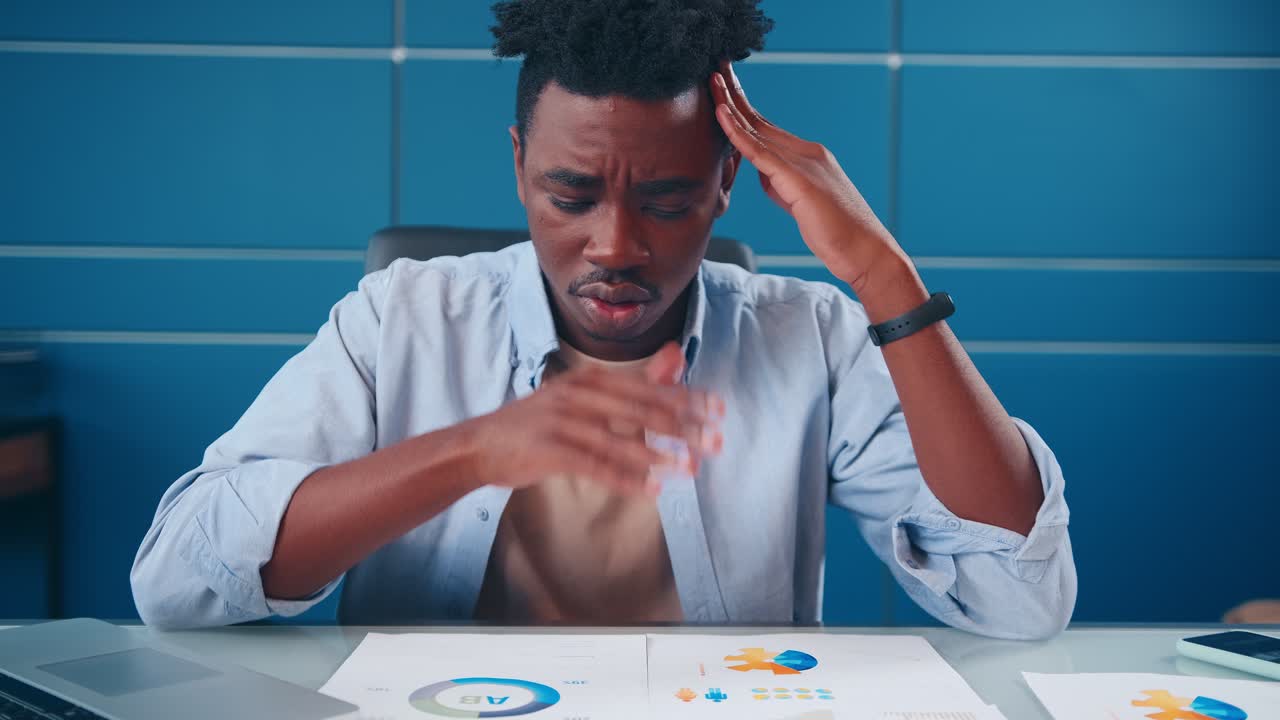 Young african american man financial advisor explore economic documents