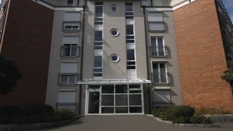 camera tilts over business building