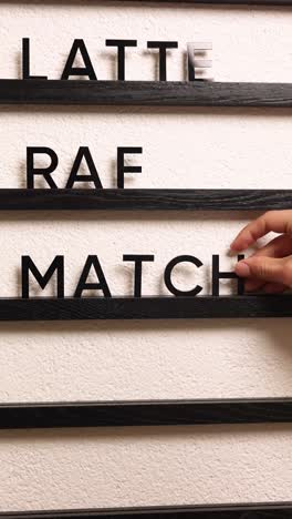 menu board with latte, raf, and matcha