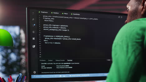 vertical video black system administrator creating a software with programming language