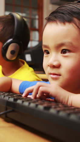 pupils in computer class at school