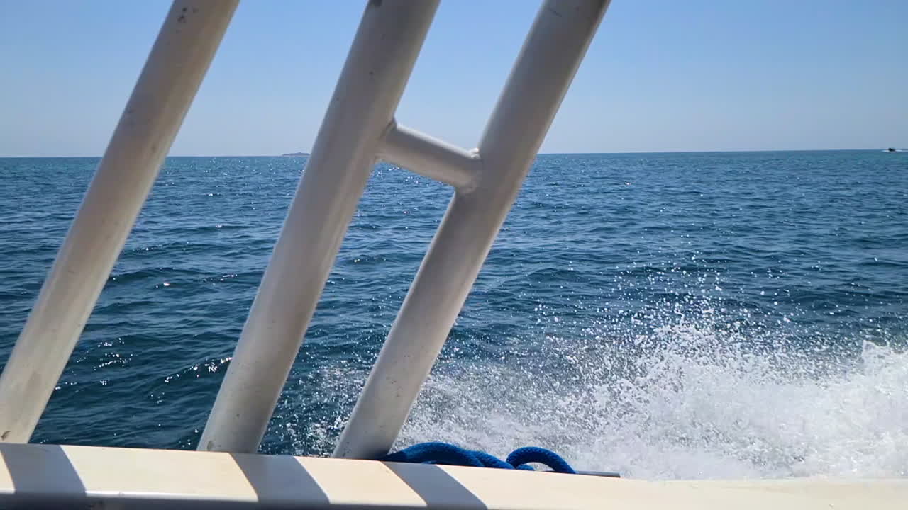 Sailing in Ocean on Sunny Day, Slow Motion. Boat Passenger POV