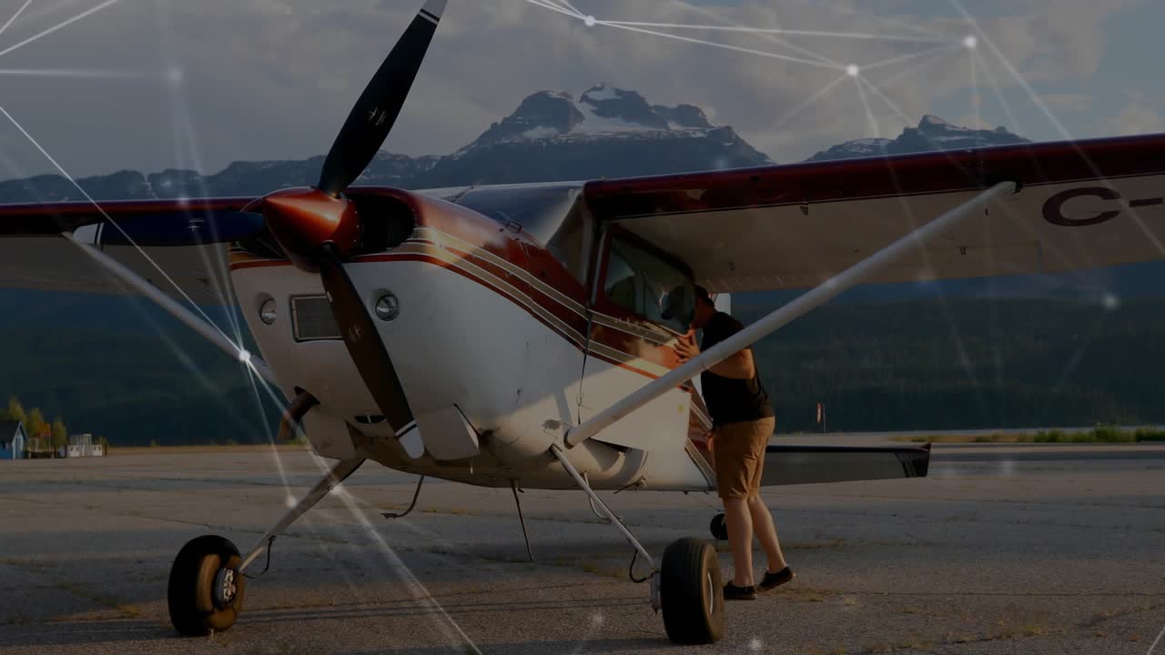 Pilot performing preflight visual checks on right wing and cabin door before boarding aircraft
