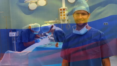 Animation-of-flag-of-colombia-waving-over-surgeons-in-operating-theatre