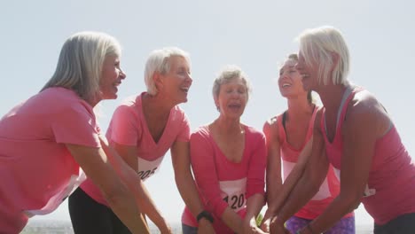 athletics women celebrating their victory