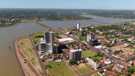 aerial view of encarnacion surrounded by parana river. famous place of samba parade. paraguay.