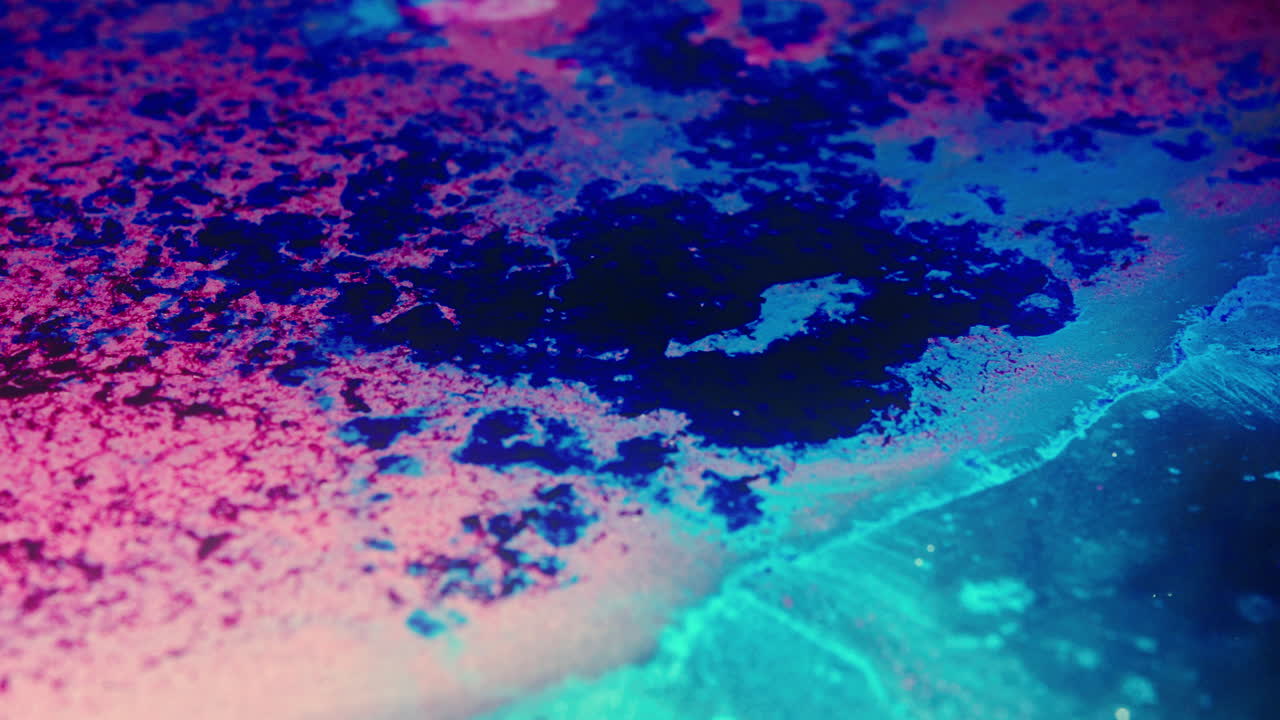 Colourful, organic, liquids macro shots buzzing and flowing
