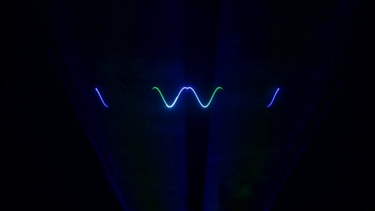 Colorful Laser Shapes Projected Onto a Screen