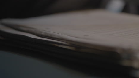documents stacked on a surface