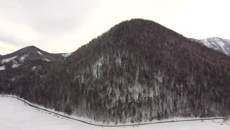 Drone-flight-over-frozen-lake-in-Austria