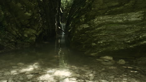 serene mountain creek and waterfall in a canyon