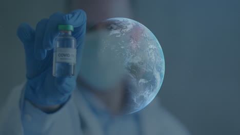 animation of globe spinning with scientist holding covid-19 vaccine wearing face masks