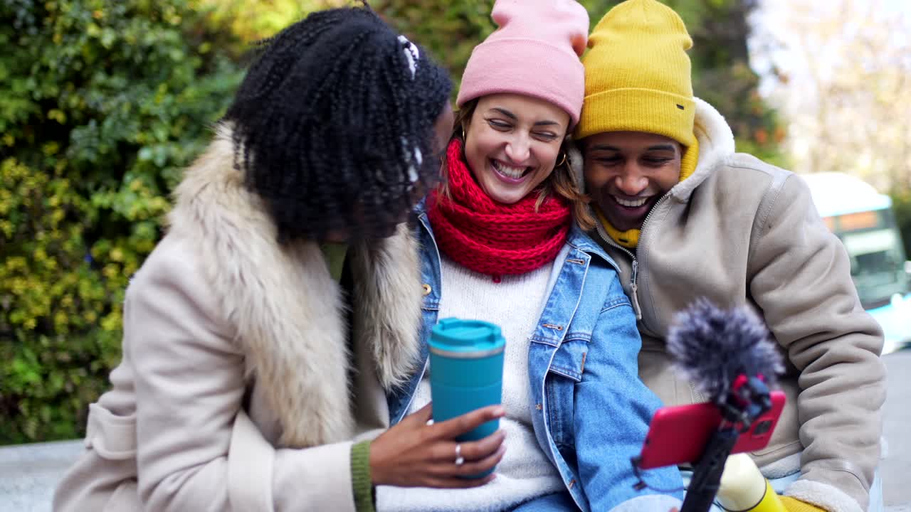 Friends capturing a fun moment with a selfie