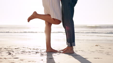Feet,-legs-and-couple-with-love-on-a-beach