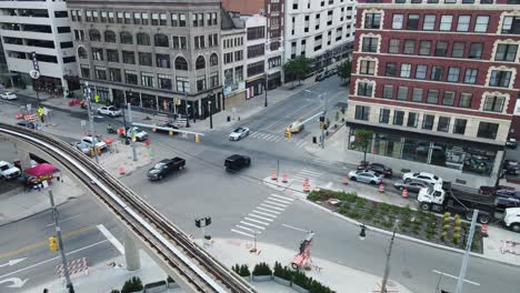 traffic at the intersection along gratiot avenue in downtown detroit, michigan, usa