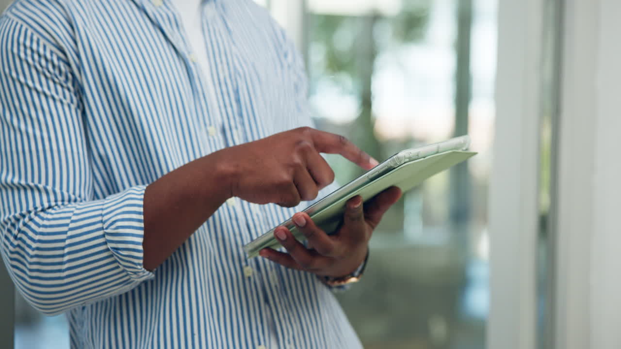 Close Up of Person Using a Digital Tablet