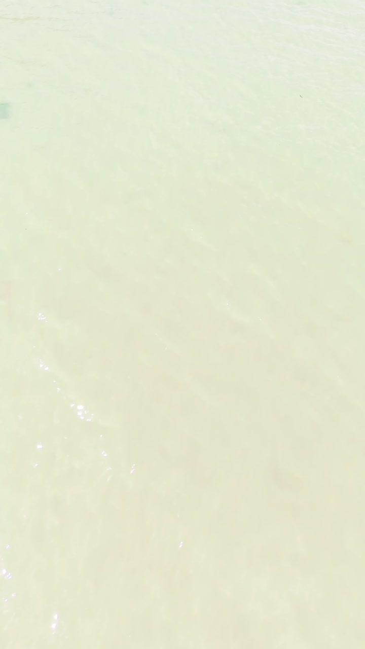Aerial View Tilt of the Clear Sea Water in Ninh HảI District.