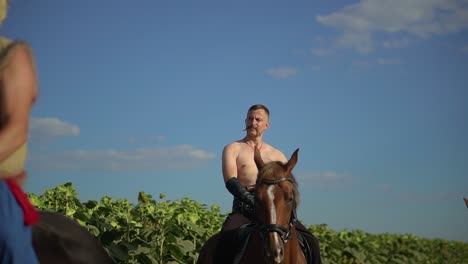 ukrainian cossack riding a horse in the field looks far 02