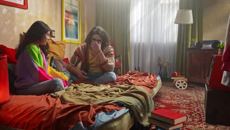 couple arguing in a retro bedroom