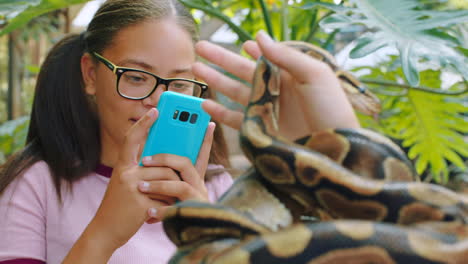 phone, nature and girl with snake in hands