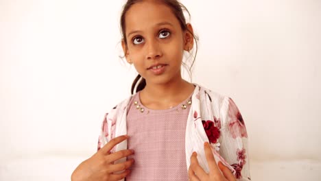 portrait of an indian child at home during coronavirus lockdown