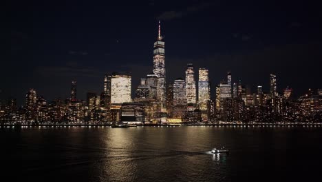 night skyline of new york skyline at manhattan in new york united states. night city landscape. financial district. new york skyline at new york united states. highrise buildings scenery.