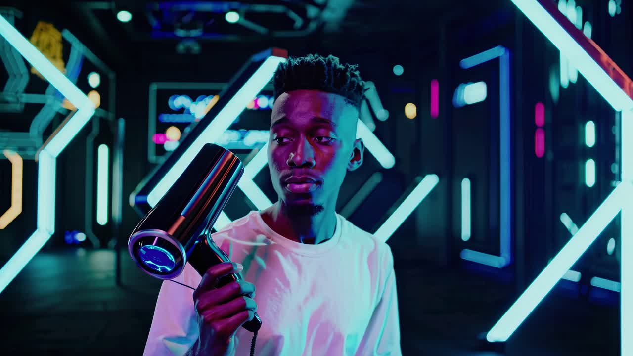Trendy Man Styling Hair with Hair Dryer in Neon Lit Futuristic Space