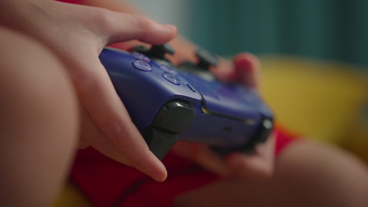 Hands holding a game controller