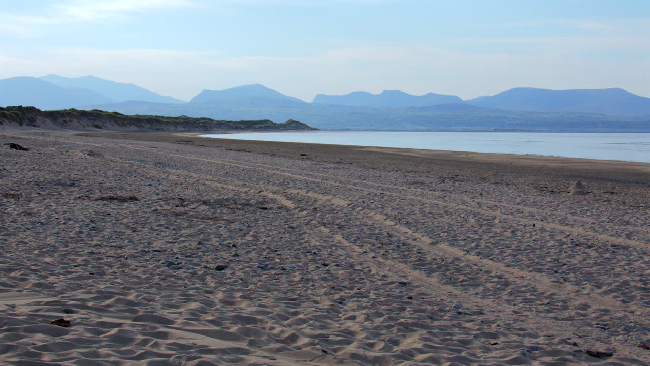 Extra wide shot looking east of Llanddwyn beach at the Newborough National Nature Reserve
